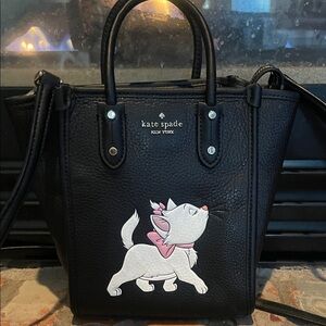 Disney x Kate Spade Aristocrats Ella mini tote. Can be worn as a crossbody.